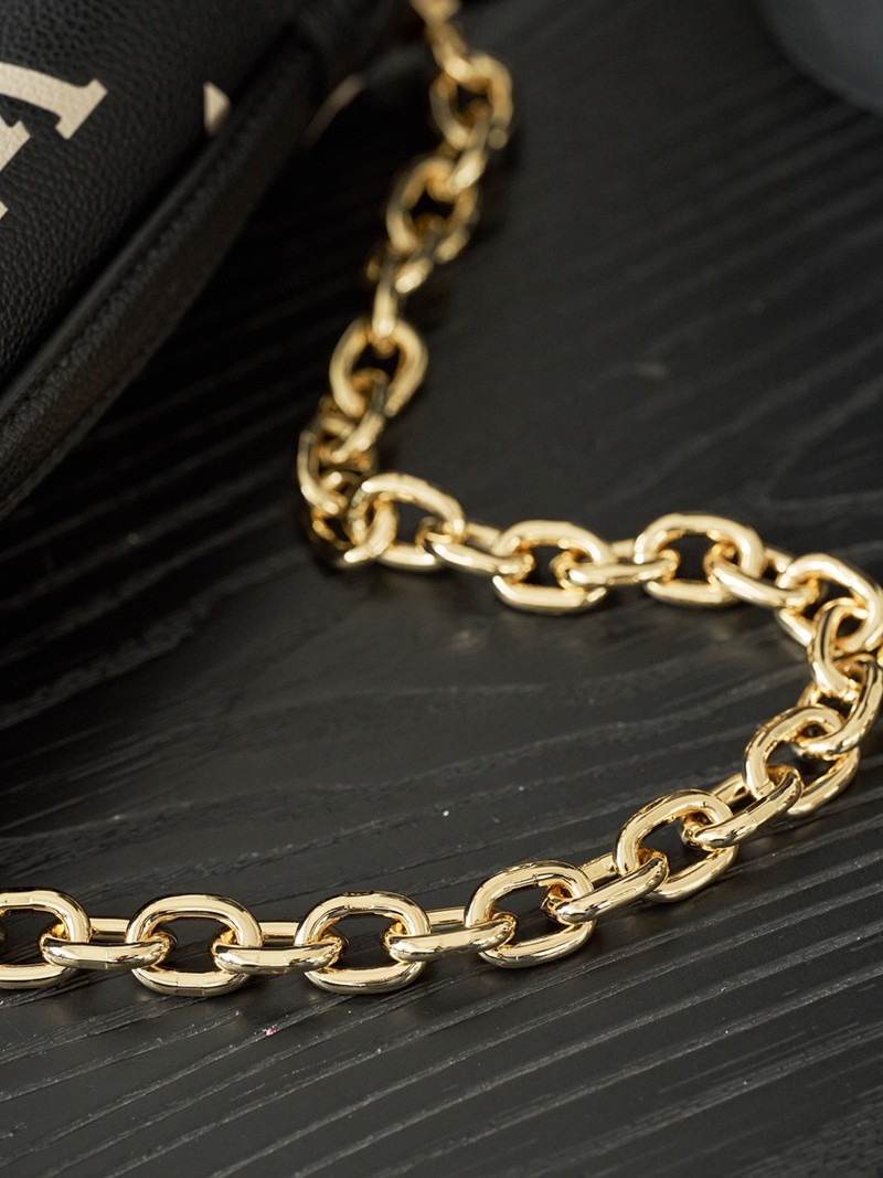 Pochette Metis East West M46596