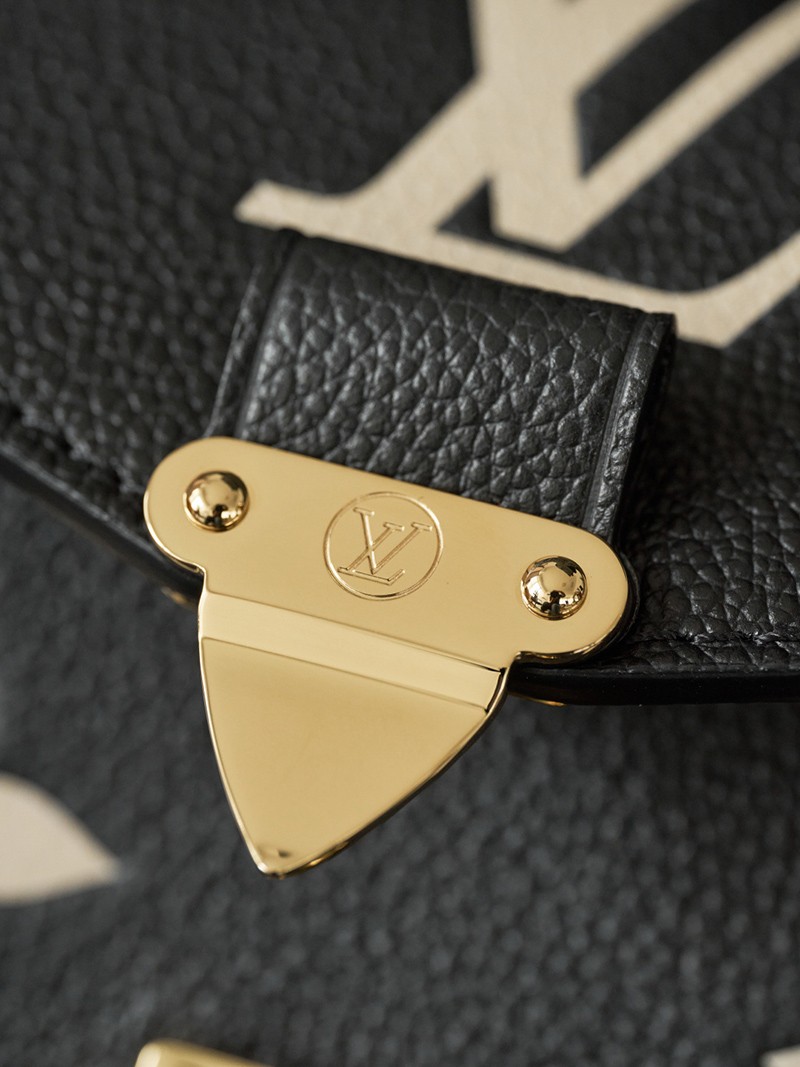 Pochette Metis East West M46596